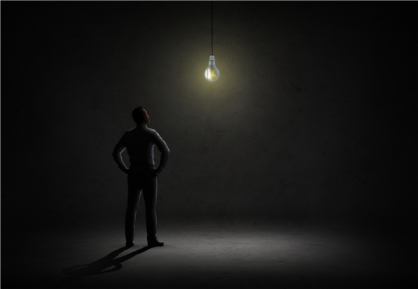 Man with a light, illustrating environmental impact on parental epigenetics